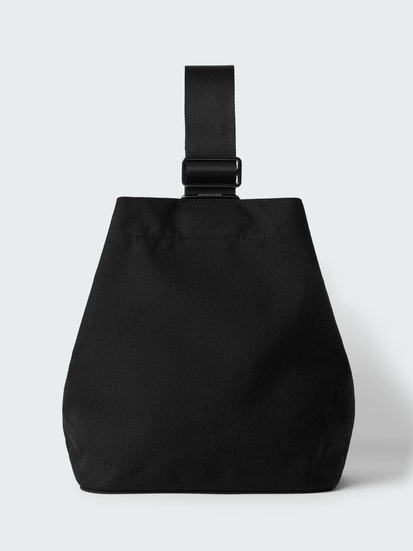 SLIDE NYLON CROSS BODY BAG IN BLACK